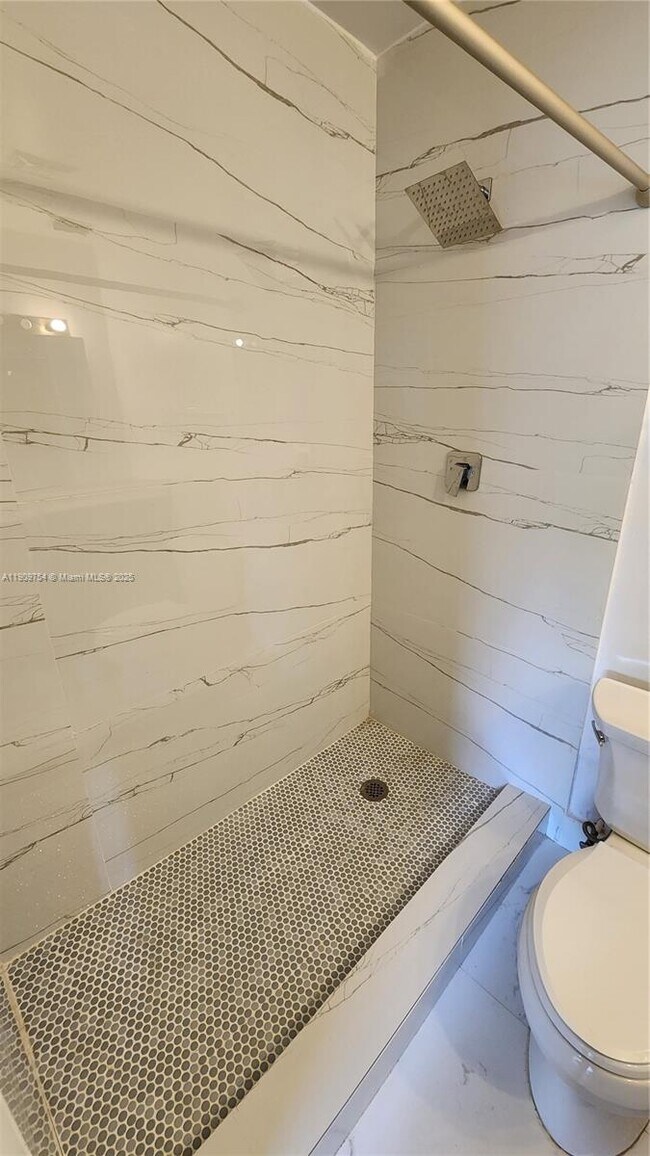 Building Photo - 3090 Coral Springs Dr