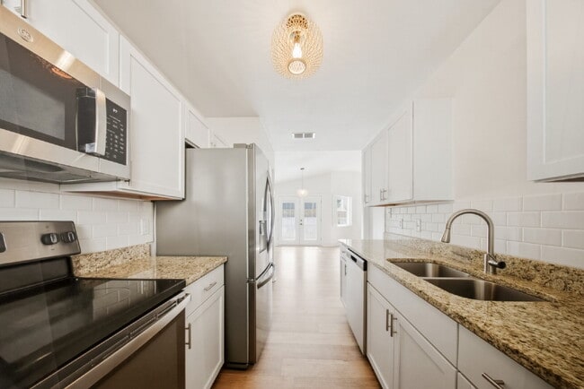 Building Photo - Beautifully Renovated 3BR/2BA Home with Fireplace, Fenced Yard & Garage in Timber Lake!