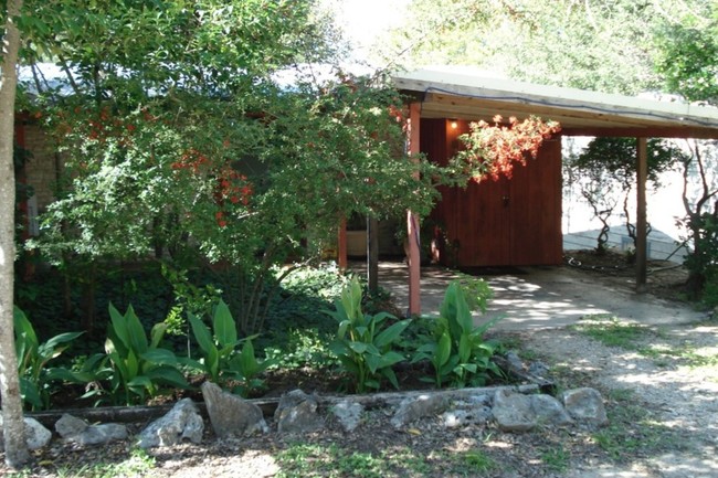 Street view of carport and utility and storage room. - 4016 Shoal Creek Blvd