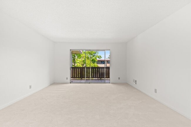 Building Photo - Modern 2-Bedroom Condo with Pool and Koi Pond Views