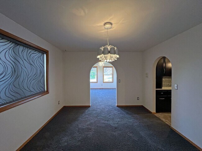 Building Photo - Stunning 4 Bedroom 2.5 Bath with Peek-a-Boo View of Puget Sound