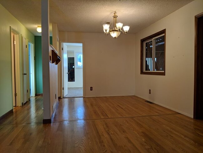 dining room open floor plan to living room and kitchen. - 28 James Circle