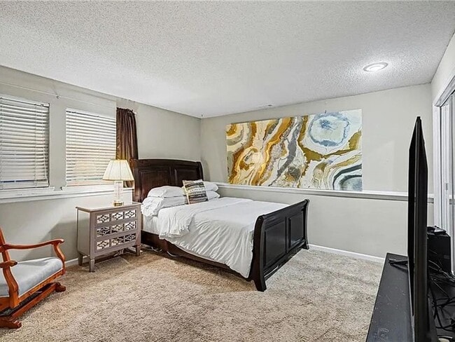 Building Photo - Newly Updated 3 Bed/2 Bath Duplex in Blue Valley with Fenced Yard, Large Deck & Attached 2-Car Ga...