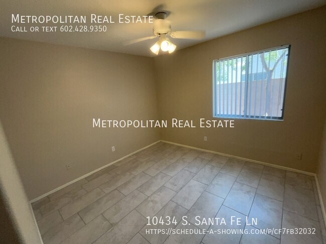 Building Photo - 10434 S Santa Fe Ln