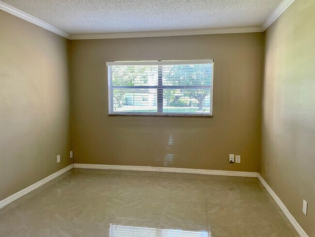 Building Photo - 608 SW Natura Blvd