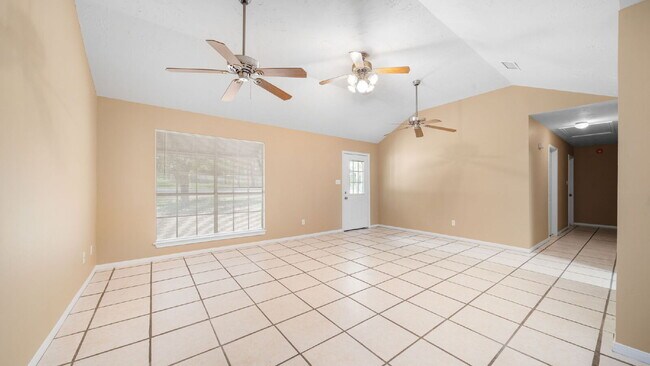 Building Photo - Enjoy comfortable, low-maintenance living in this updated, pet-friendly, carpet-free 3-bedroom ho...