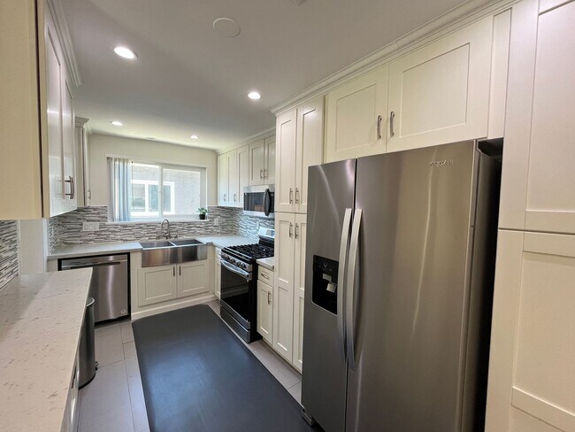 Building Photo - AVAILABLE NOW! Upgraded Encino 4+2.5 w/all...