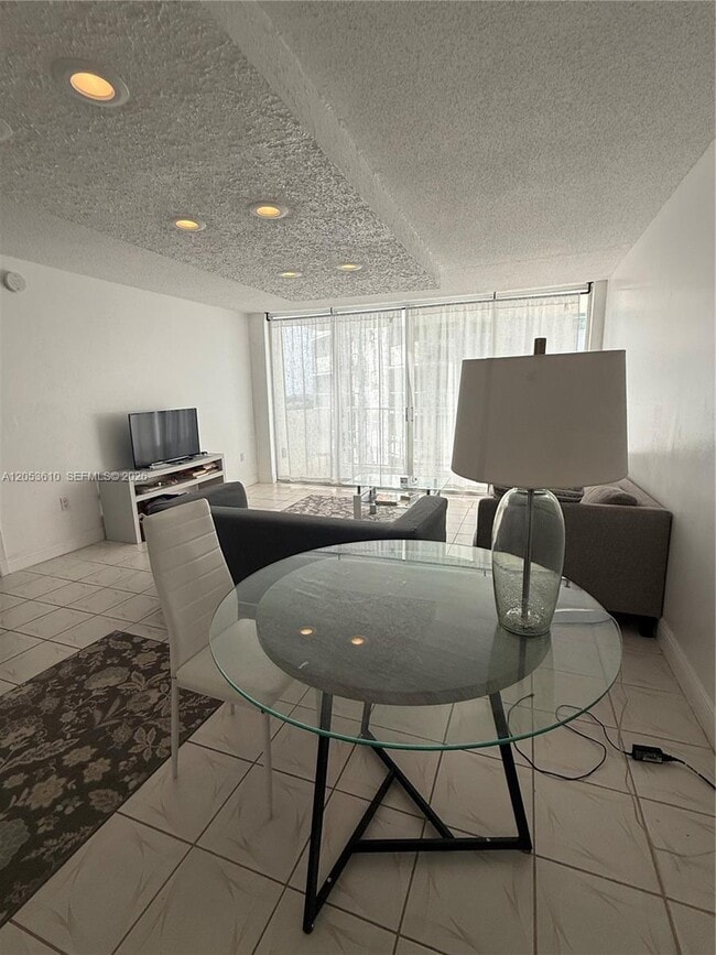 Building Photo - 5838 Collins Ave