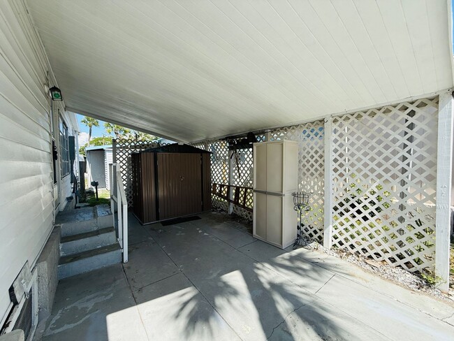Building Photo - Beautiful fully furnished one bedroom, one bath manufactured home in a 55+ deed restricted gated ...