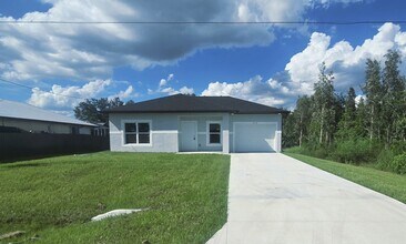 Building Photo - BRAND NEW 2/2/1-SW LEHIGH ACRES