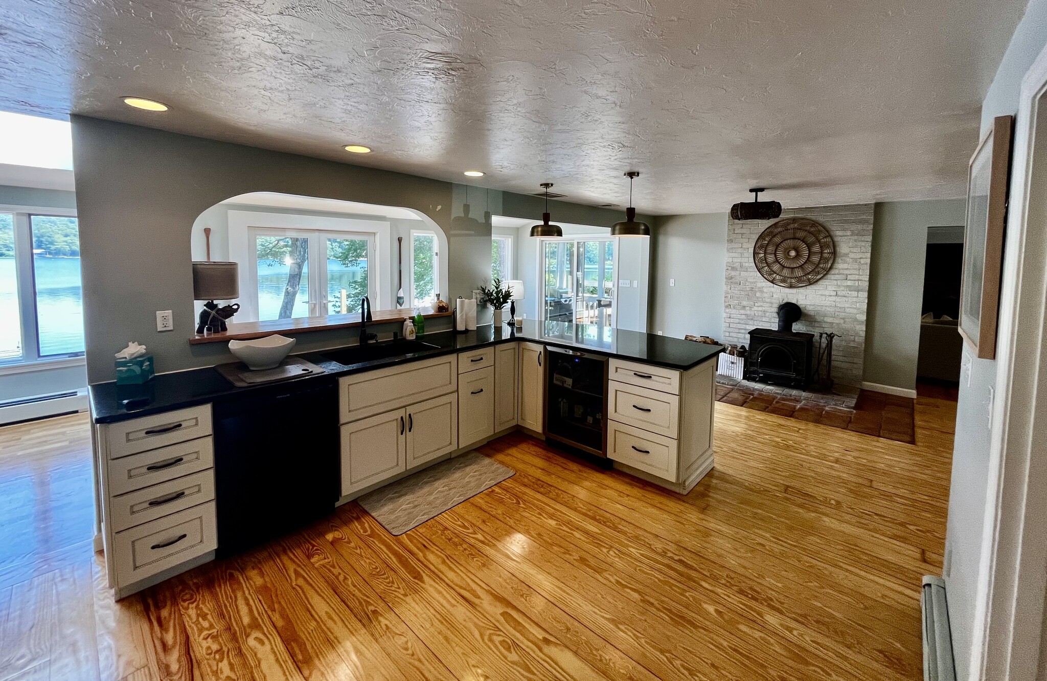 open kitchen into sun room - 56 Goldfinch Ln