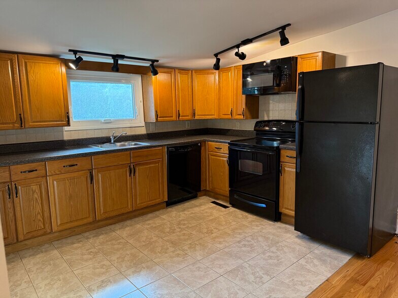 Stylish Kitchen w/newer black appliances! - 26 Patricia Ln