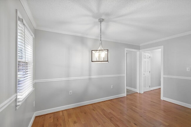 Building Photo - Welcome to this Comfortable, Charming & Outdoor Living, Single-Level Home