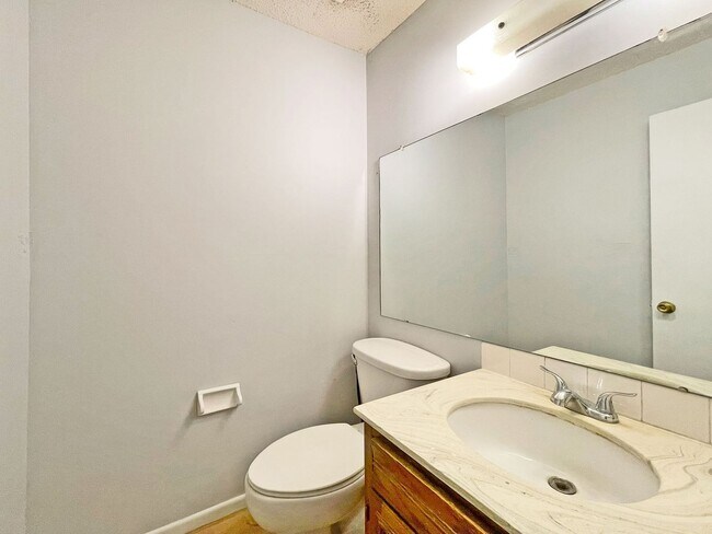 Building Photo - Spacious End-Unit Townhome with Fireplace, Family Room, 2-car Garage, Community Pool & Playground...