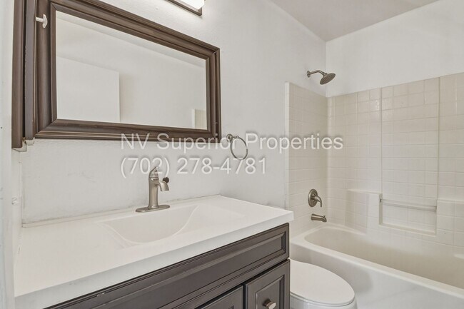 Building Photo - SE!!! 4 Bedrooms!! Master Downstairs!! No Carpet!! Synthetic Grass front and back!!