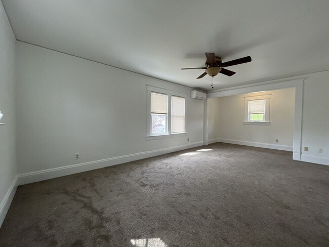 Building Photo - Expansive 4BR 2,900+ Sq Ft Home with Theater-Style Living Room & Bonus Hobby Workshop