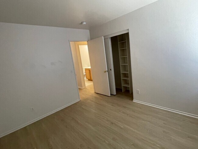 Building Photo - Adelanto Home-3 Bedrooms,2 Bathrooms, Laminate Floors, Indoor Laundry Room, Large Back Yard