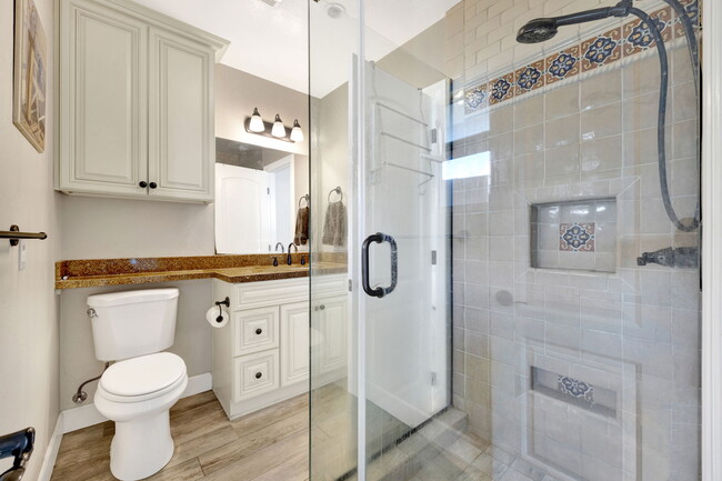 bathroom connects from kitchen through to bedroom - 319 W Chevy Chase Dr