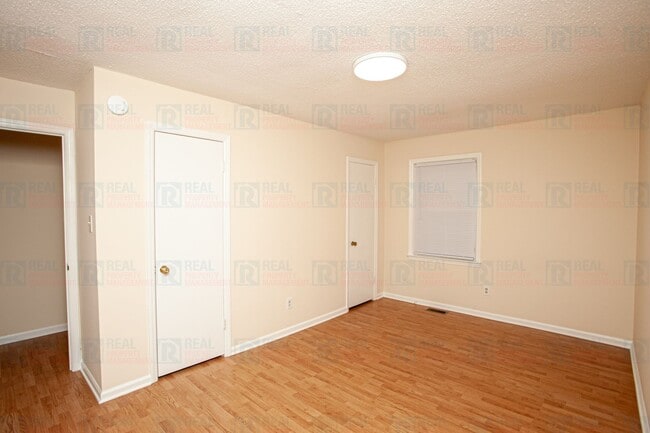 Building Photo - 8722 Rollingwood Rd