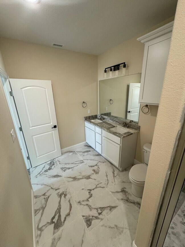 Building Photo - Beautiful modern Townhome in Peaster ISD NO Water Bill -  Fenced Yard - GATED: Spring Move in Spe...
