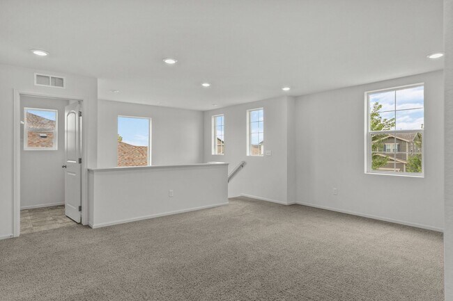 Building Photo - Beautiful 4 Bedroom Home in The Lakes at Centerra | 2,583 Sq. Ft.