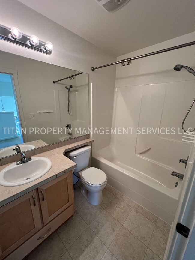 Building Photo - Beautiful Three Story Townhouse with Gas Fireplace, Balcony & 2-Car Garage