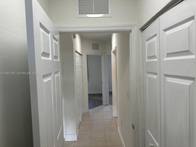 Building Photo - 3390 NE 13th Cir Dr