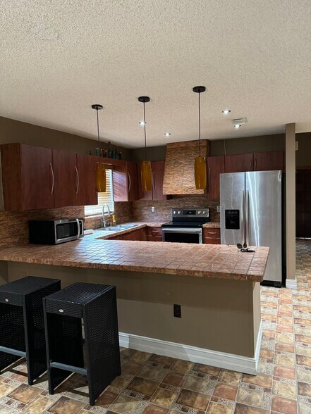 Building Photo - 6936 W 25th Ave