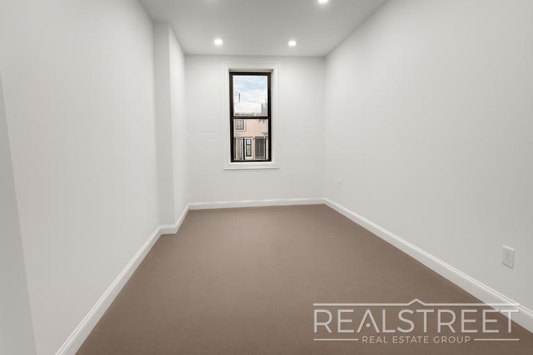 Building Photo - Spacious 2-Bedroom, 2-Bath Apartment in Bed-Stuy with Modern Amenities
