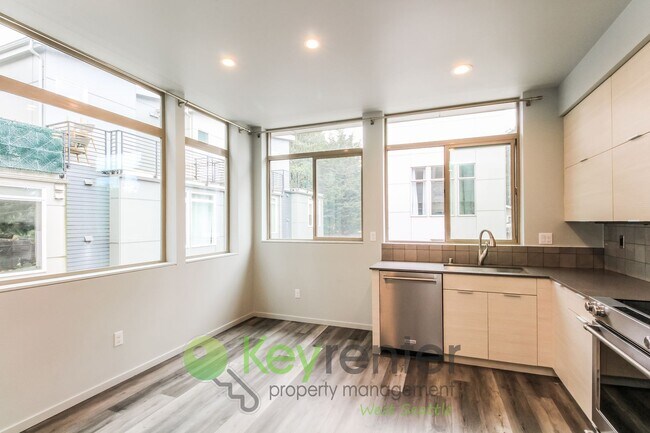 Building Photo - Modern 3 Bedroom with Rooftop Deck and In Unit Laundry