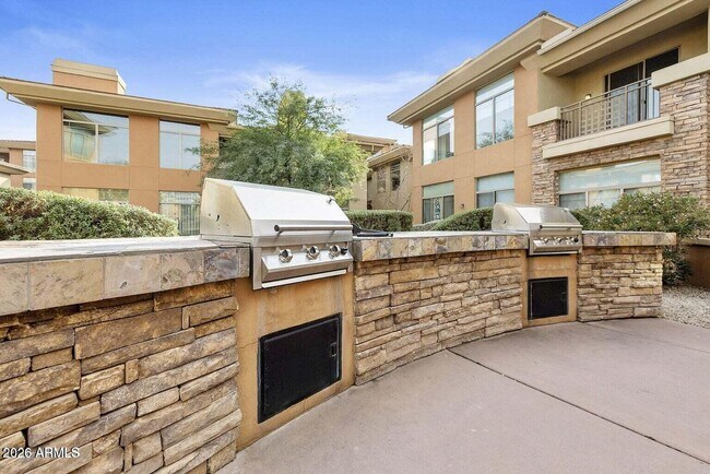 Building Photo - 14450 N Thompson Peak Pkwy