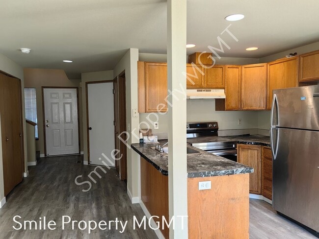 Building Photo - Recently updated New LVP Flooring, New Interior Painting, New Refrigerator.