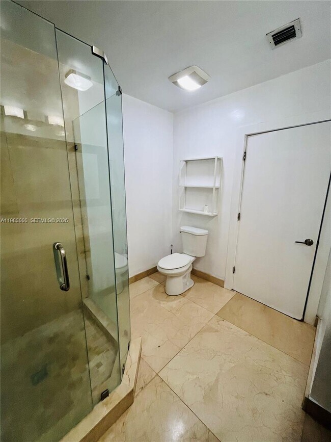 Building Photo - 10190 Collins Ave