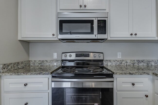 Building Photo - Stunning 3 Story Town-Home near Texas Tech...