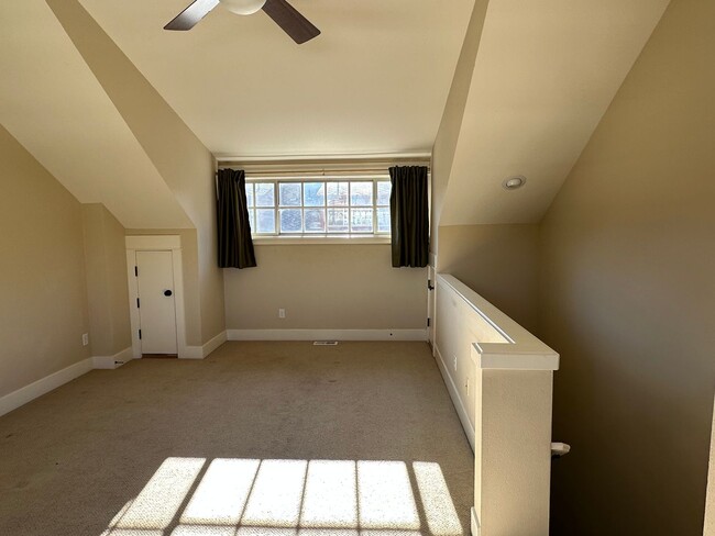 Building Photo - Stunning Tri-Level Condo with Open Concept Layout, Loft, and Private Patio!