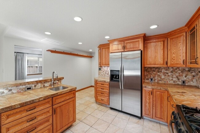 Building Photo - Beautifully Updated 3BR/2BA Home with Private Garden Oasis