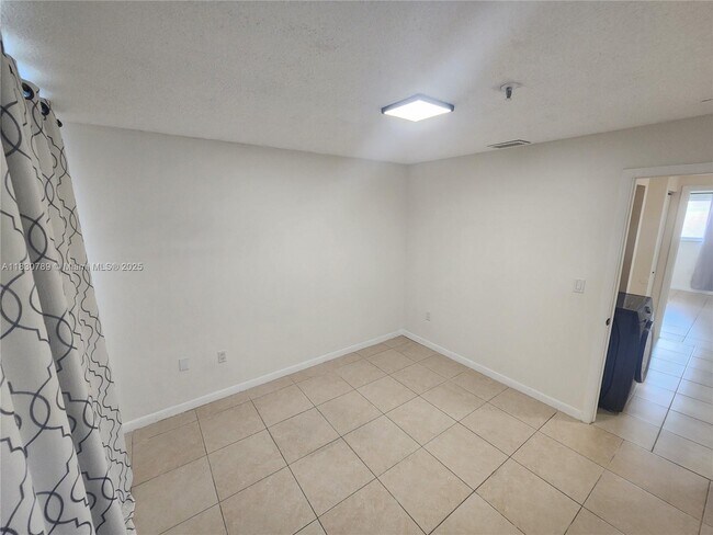 Building Photo - 7905 W 30th Ct