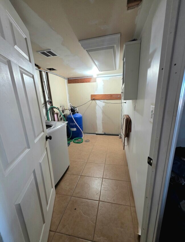 Laundry room with double hook-ups - 1409 2nd West Hill Dr