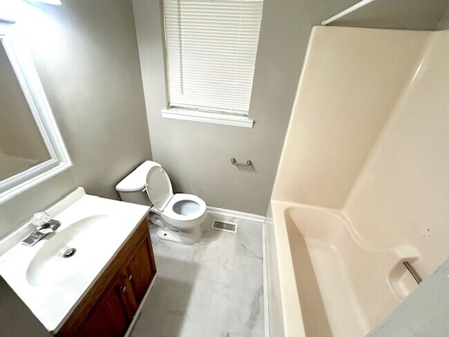 Building Photo - Spacious 4-Bedroom, 2-Bath Home Located in...
