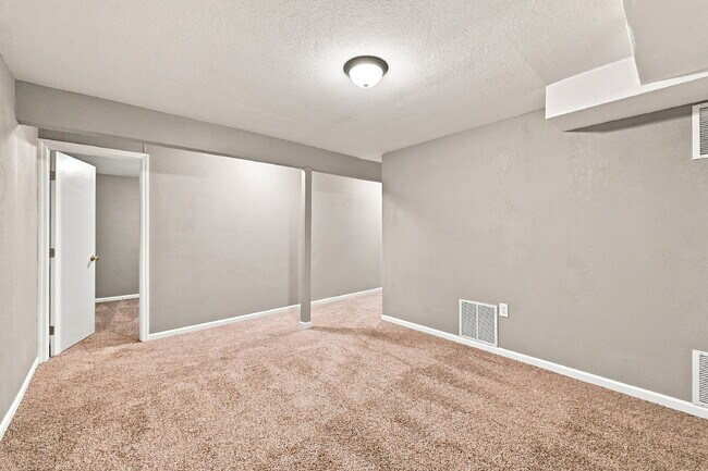 Building Photo - $2,195.95, 5-bed, 2.5-bathroom located in Colorado Springs with a fenced backyard.