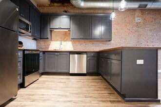 Building Photo - 210 E Washington Ave