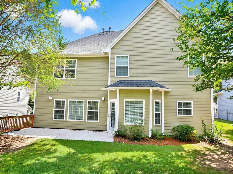 Private backyard with patio—perfect for outdoor relaxation or entertaining. - 2143 Somerset Pl SE
