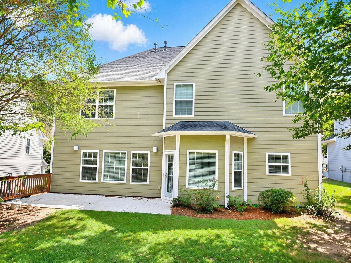 Private backyard with patio—perfect for outdoor relaxation or entertaining. - 2143 Somerset Pl SE