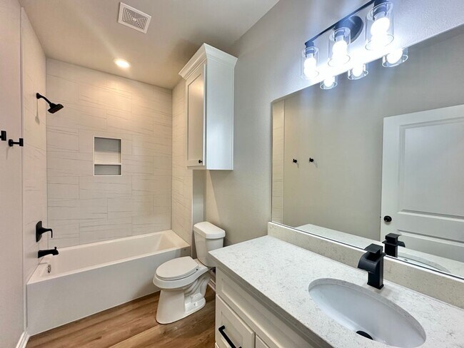 Building Photo - Tour Today! New Construction 4 Bed 2 Bath Triplex!