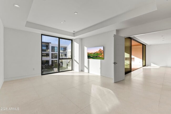 Building Photo - 6587 N Palmeraie Blvd