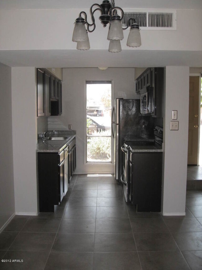 Building Photo - 7736 E 1st Ave