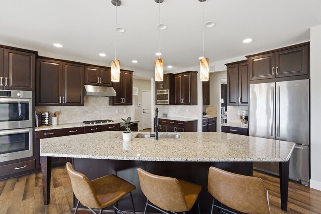 Building Photo - One-of-a-Kind 4-Bed Castle Rock Retreat with 4 car Attached Garage