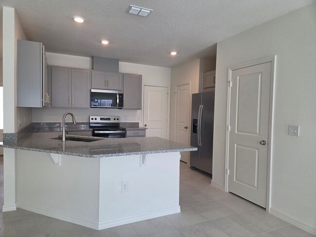 Building Photo - Brand New Townhome in The Sanctuary