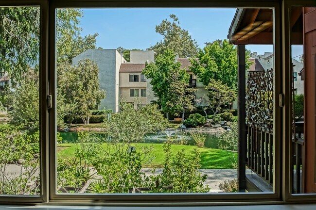 Building Photo - SPACIOUS, 2-STORY, 3BR2.5BA LAKESIDE CONDO...