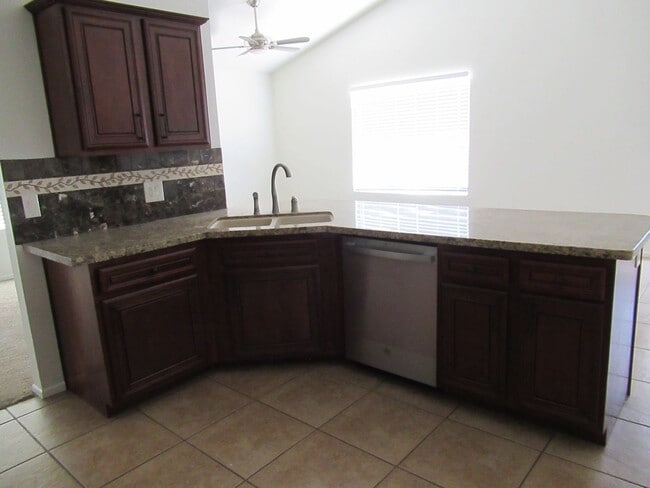 Building Photo - Nice 4 Bedroom + Den Home With Pool In AHWATUKEE!